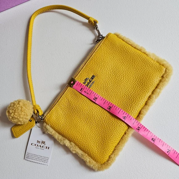 Vintage NWT Coach Shearling Small Wristlet in Banana Yellow With Pom Pom - Picture 14 of 16
